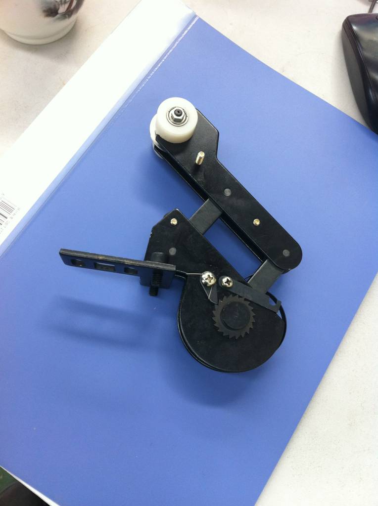 自動(dòng)緊絲器